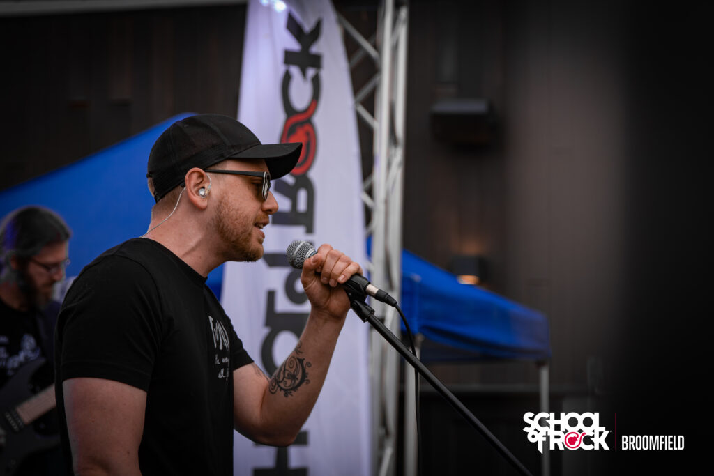 Isaac Askew singing at the Hellfest School of Rock Broomfield end season show